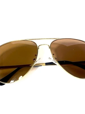 Pilot glasögon  - Pilot glasögon med bågar i Ljusguld och bruna glas . Nya oanvända 