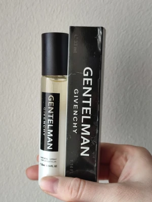 Givenchy Gentleman - Givenchy Gentleman Perfume. 33ml bottle. New! Some flaws on the front of the box.