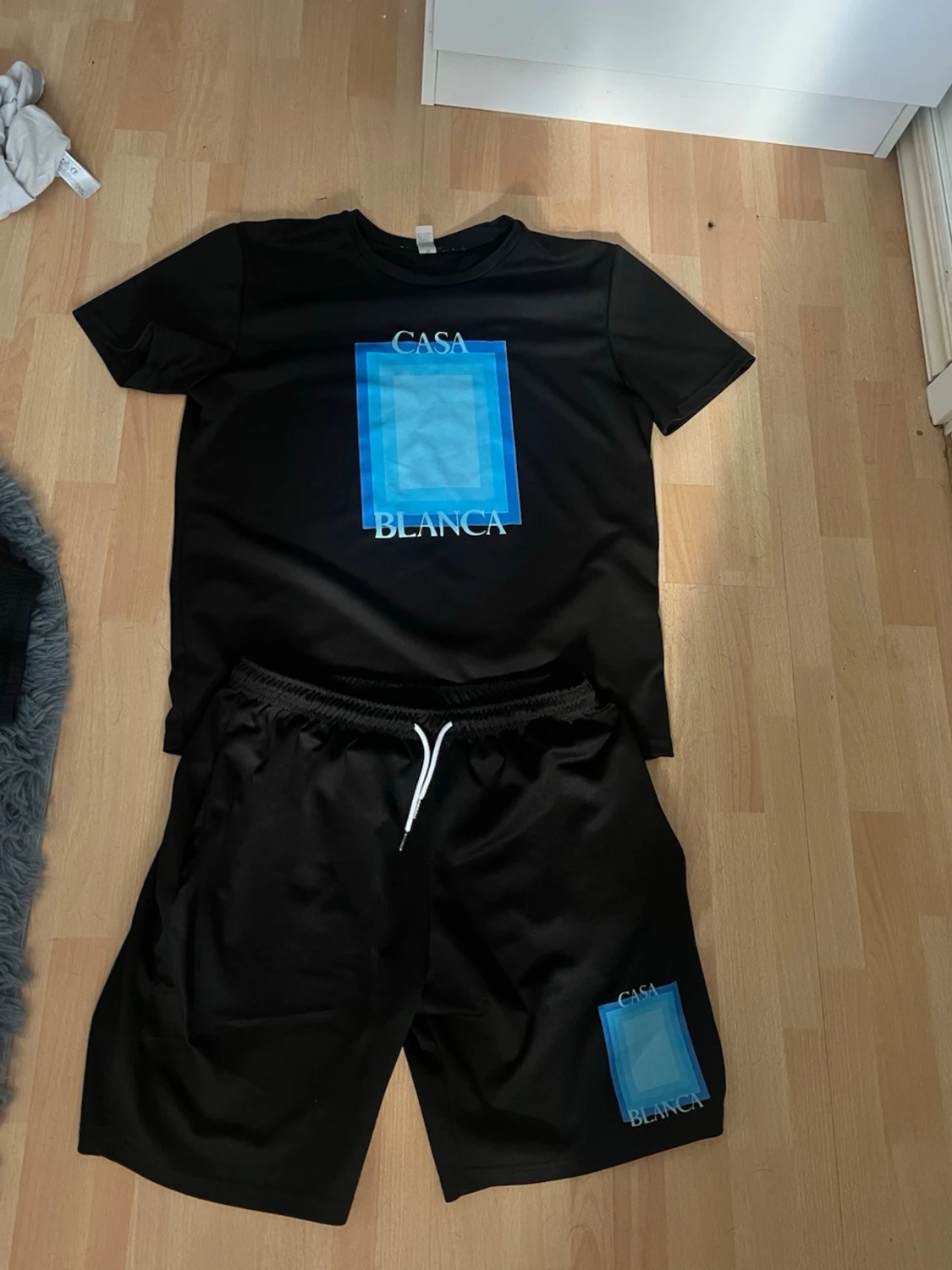 Casa Blanca svart set med blå tryck
