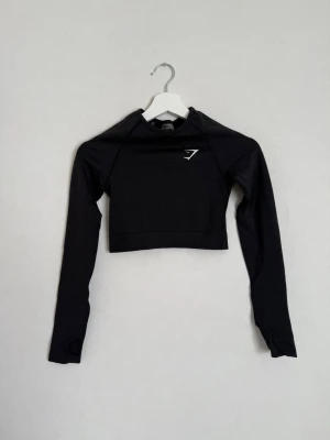 Långärmad T-shirt – Gymshark – Storlek XS - Långärmad träningströja från Gymshark, storlek XS. Fint skick!