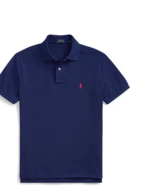 Mörkblå pikétröja från Polo Ralph Lauren - Klassisk mörkblå pikétröja från Polo Ralph Lauren jätte härlig o skön till sommaren nu