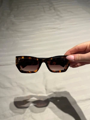 Solglasögon  - Aldrig använda 