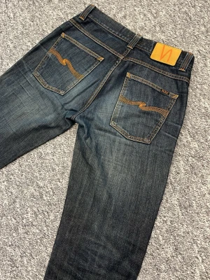 Nudie jeans ” Bootcut” - Tjenare!! Säljer nu mina extremt snygga Nudie jeans med lite bootcut. Storlek W32 och L34. Hör av dig vid minsta fråga 👍