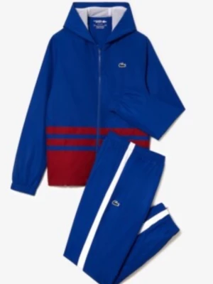  Lacoste tracksuits  - Säljer en sällsynt Lacoste dress Lacoste huva och dragkedja. Jackan har röda detaljer och vita ränder, samt Lacoste-logga på bröstet och stort tryck på ryggen. Byxorna har vita ränder längs benen och elastisk midja