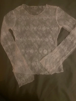 vit spetstopp  - genomskinlig spetstopp, knappt använd 