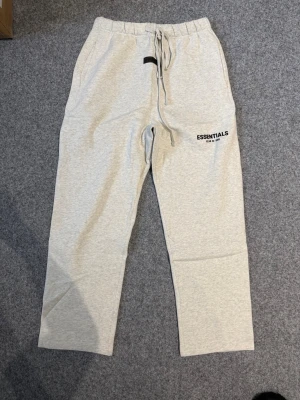 Essentials light oatmeal gray hoodie - Size M, true to size. No stains or damage, very new!