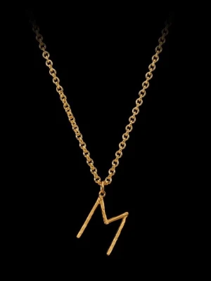 Maria Nilsdotter halsband N - Snyggt halsband i guldfärgad metall med ett stilrent hänge i form av bokstaven N. Kedjan är tunn och elegant, perfekt för att ge en personlig touch till din stil. Kommer i en svart smyckesask. Modellen wonky letter nacklace från Maria Nilsdotter. Halsbandet är i jättefint skick, boxen till halsbandet medföljer. Kedjan är 45cm. Kan sänka priset lite vid snabbt köp 💕