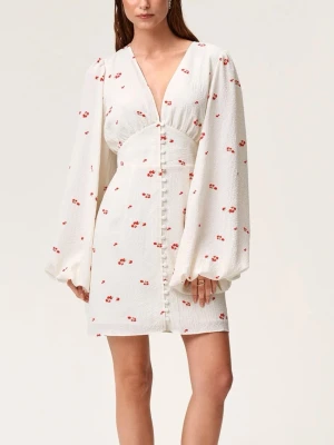 Vit kort klänning med blommigt mönster - Jättefin inprincip oanvänd kort adoore klänning.       