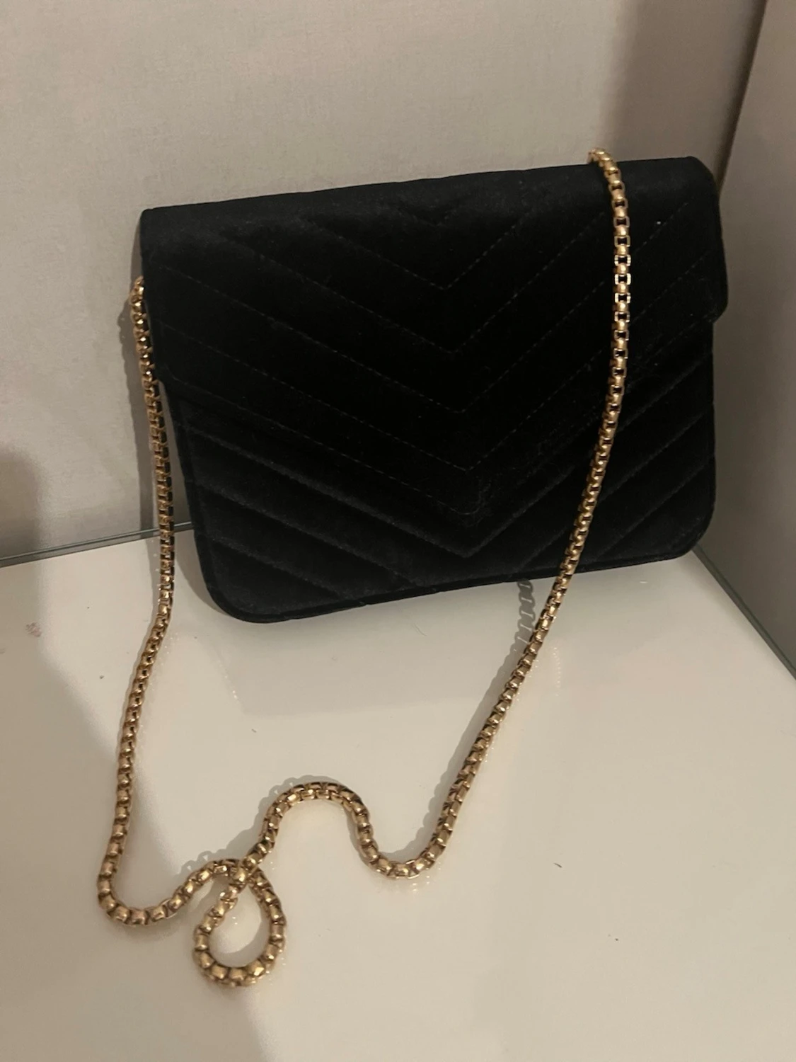 Svart quiltad kuvertväska med kedja