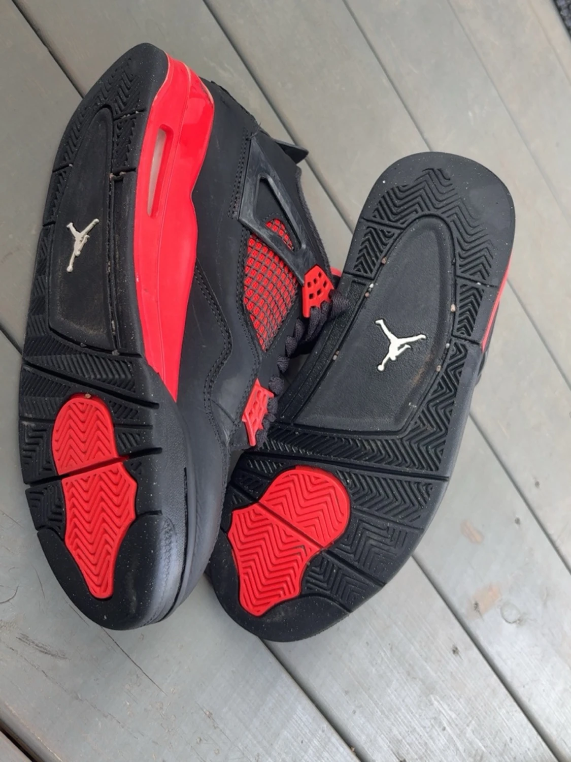 Svarta och röda Air Jordan 4 sneakers - 1