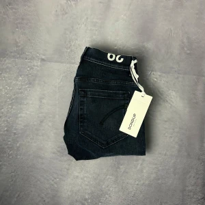 Helt nya dondup George jeans - Helt nya dondup George jeans i storlek 29.