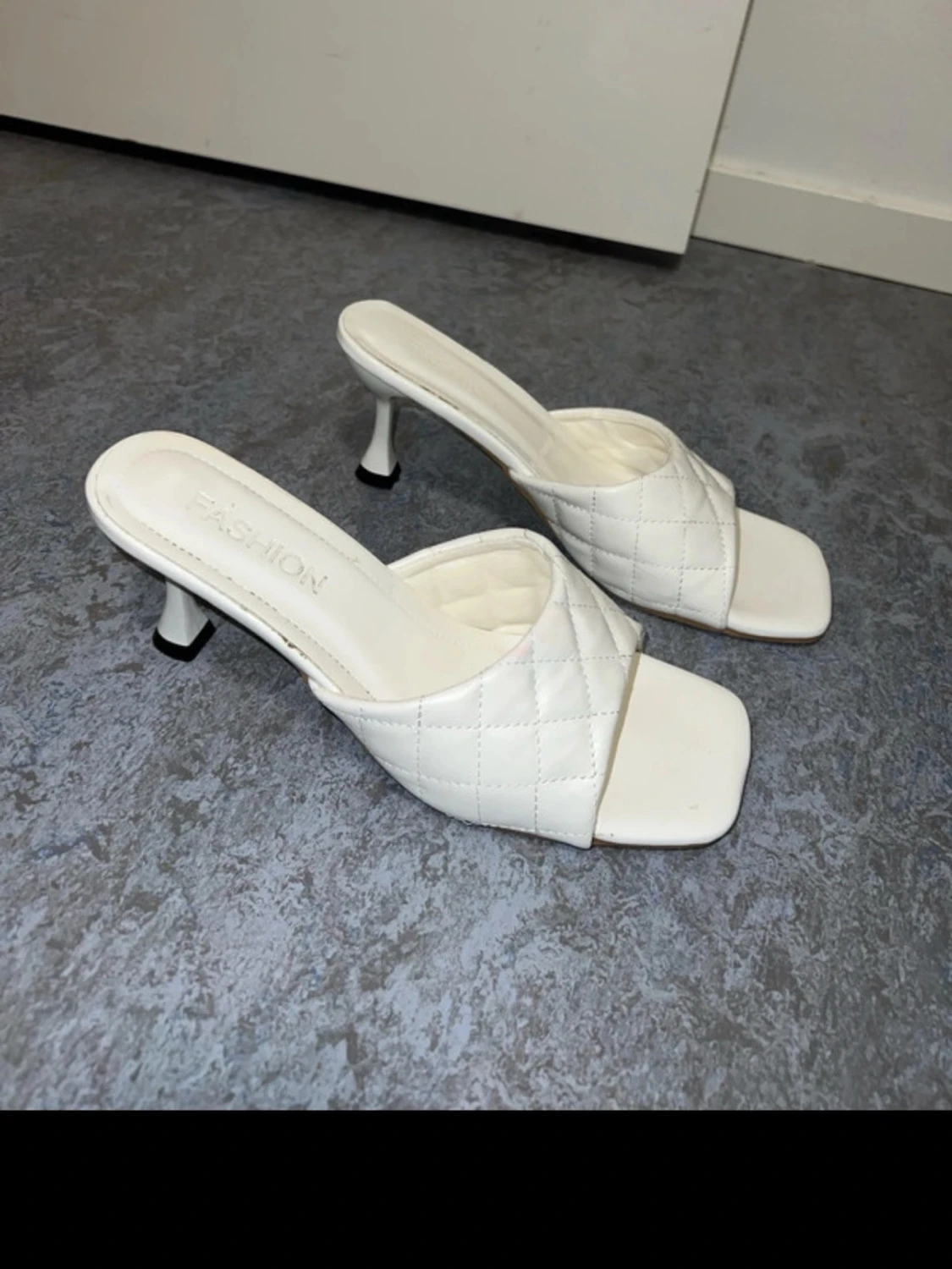 Vita quiltade slip-in pumps