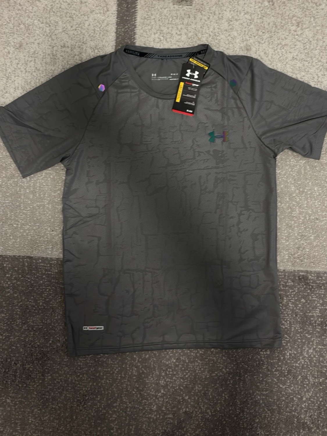 Grå träningströja från Under Armour