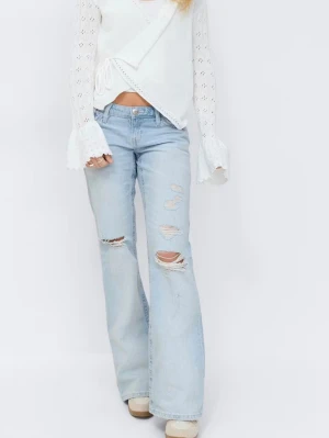Ljusblå slitna bootcut jeans - snygga jeans från gina! använda fåtalet gånger så i bra skick! nypris 400 🥰