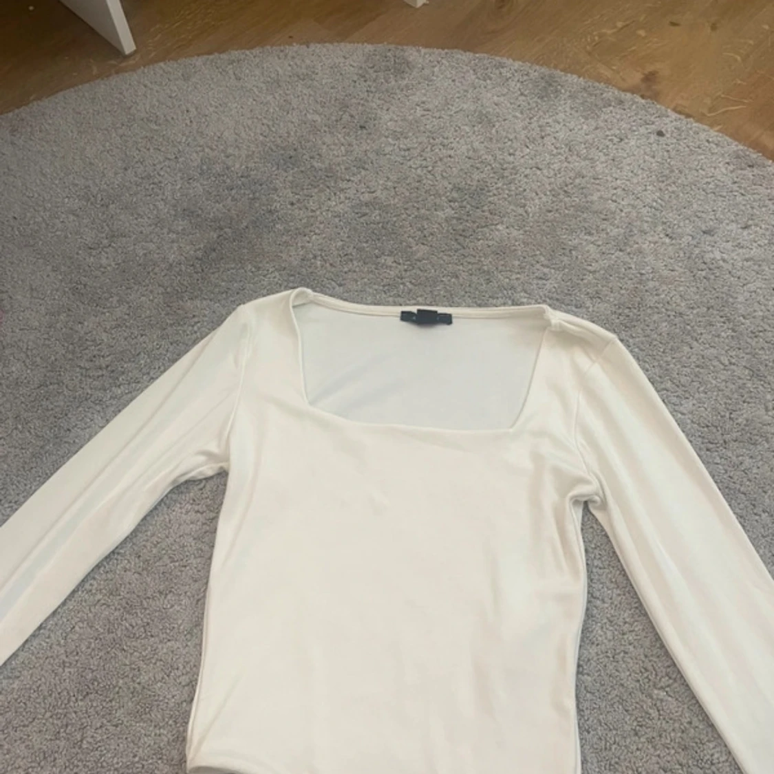 Vit långärmad topp från Amisu