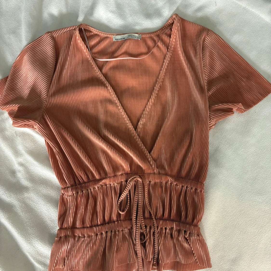 Rostfärgad omlottopp med knytband