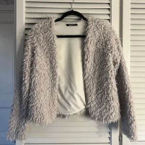 fluff kofta - aldrig använd 