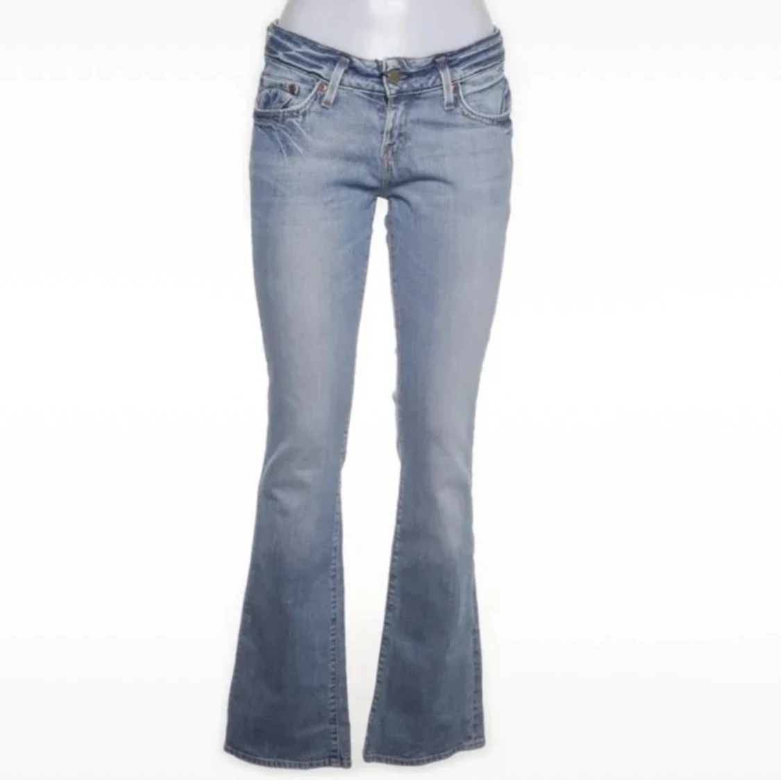 Ljusblå bootcut vintage jeans från Lee - 1