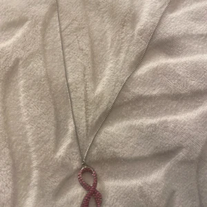 Rosa bandet   - Rosa bandet halsband