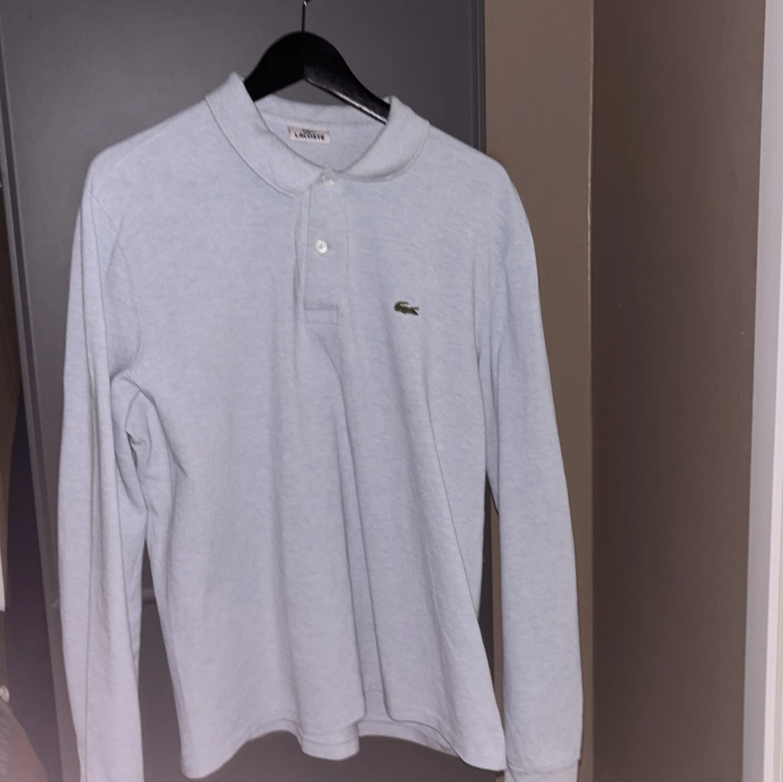 Grå långärmad pikétröja från Lacoste