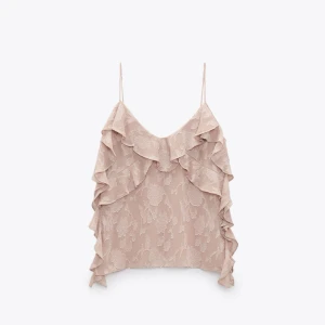 Zara volang topp - Eftertraktad Zara topp som är slut i lager. Storlek M men passar också folk med S. Använd 3 gånger🩷🙌Skriv om ni vill ha fler bilder!!