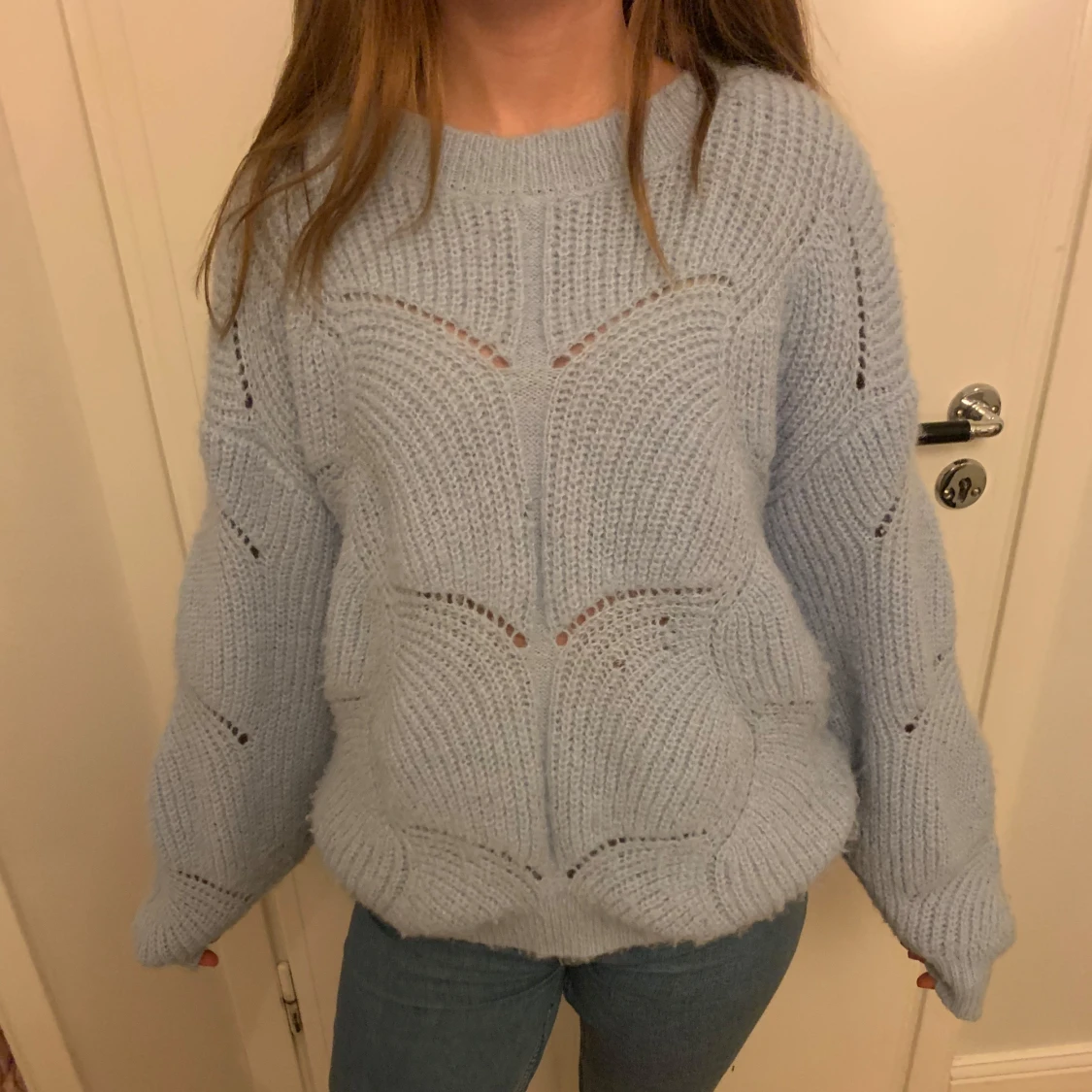 Ljusblå stickad tröja