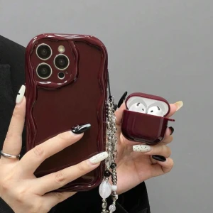 Lyxigt mobil- & AirPods-set – matchande design! ✨ - Detta set innehåller både ett mobilskal och ett AirPods-fodral i matchande färg med dekorativ kedja.