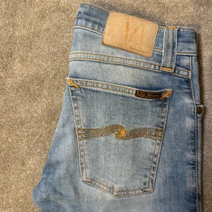 Nudie Jeans - | Condition: 9/10 | Color Blue, White and orange | What is included: Only the jeans | Retail price: 1600kr