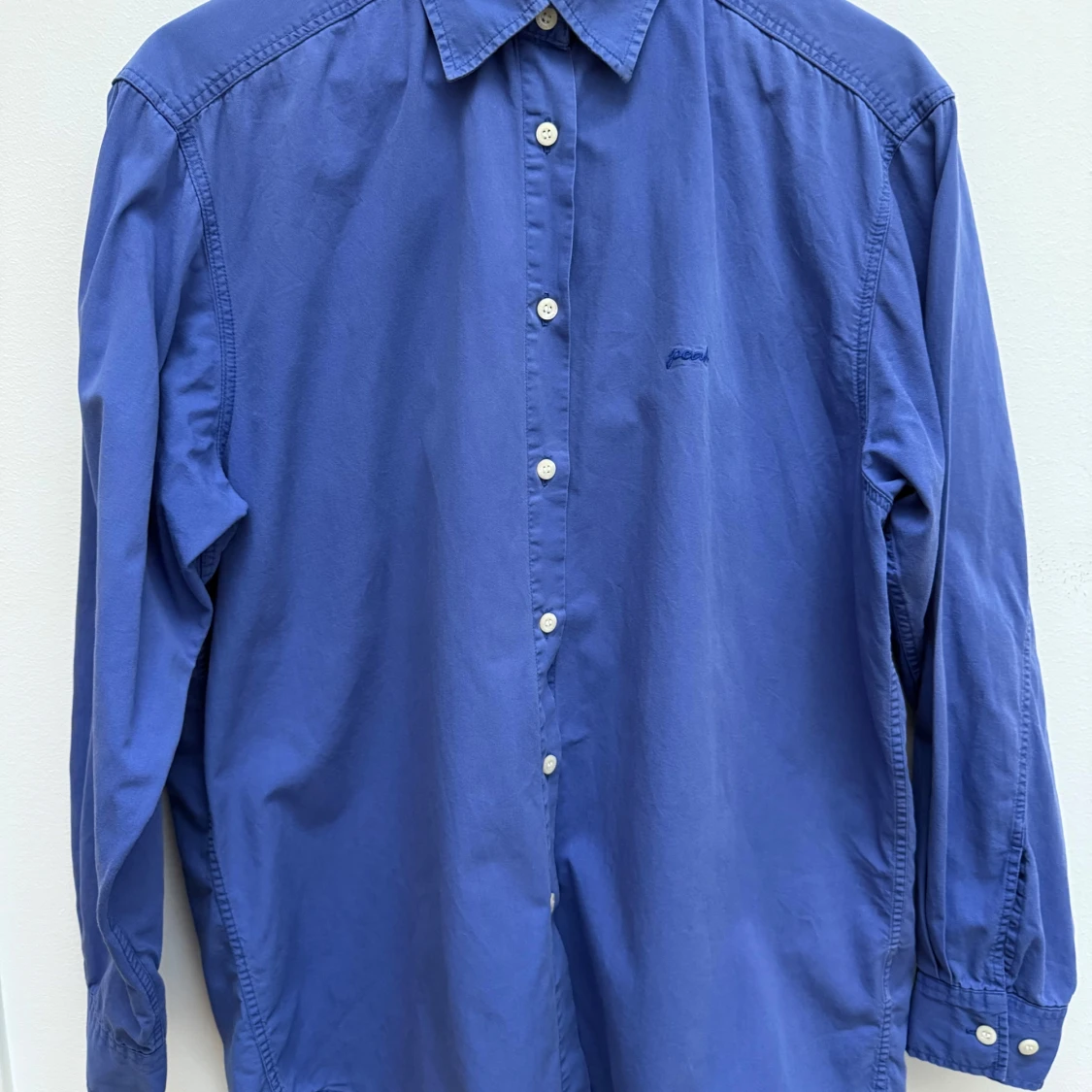 Blå Peak Performance skjorta