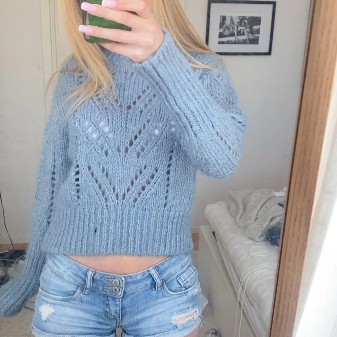 Ljusblå stickad tröja
