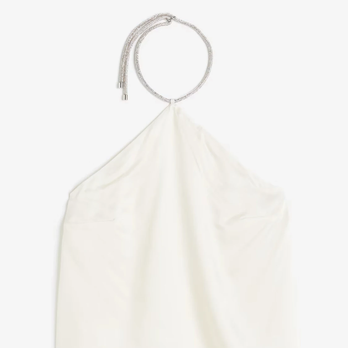 Vit halterneckblus med glittrigt band