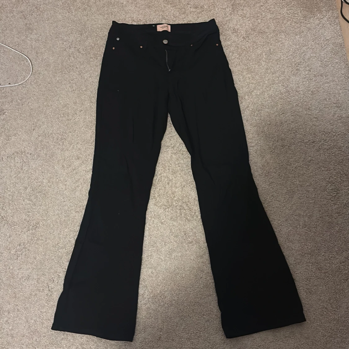 Svarta bootcut byxor