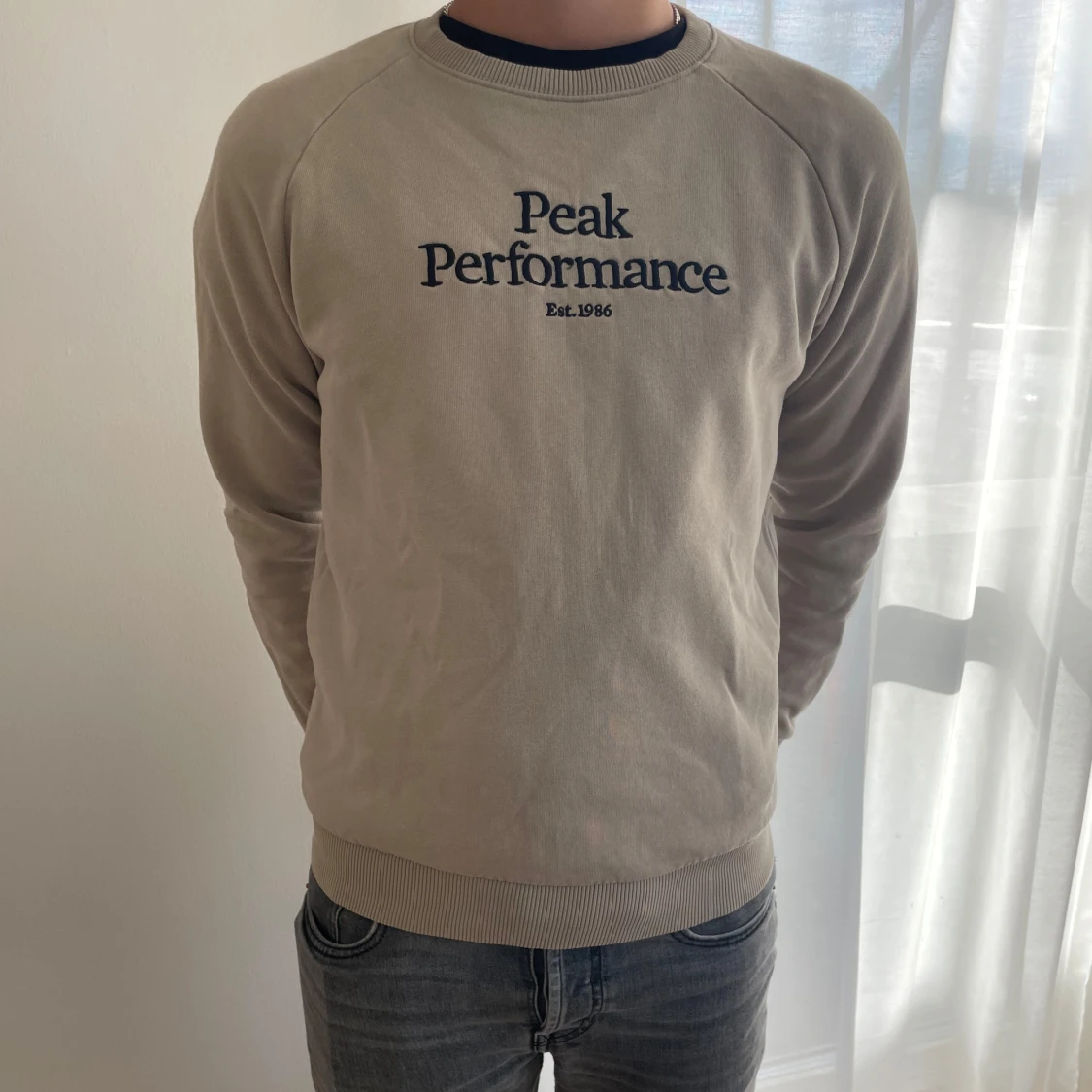 Beige Peak Performance sweatshirt