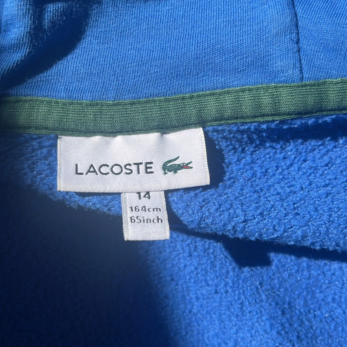 Blå hoodie från Lacoste med dragkedja - 2