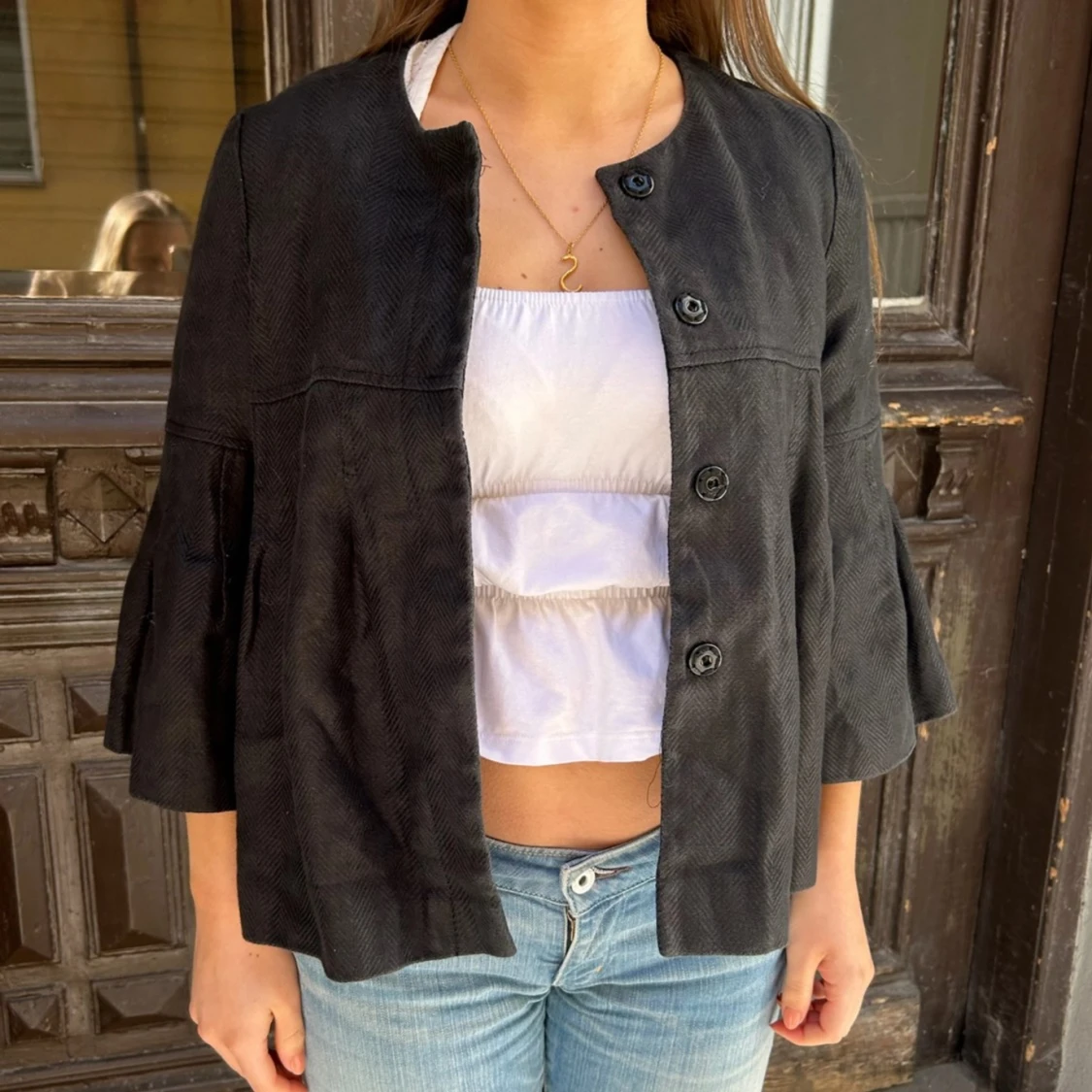 Trekvartsärmad svart kappa