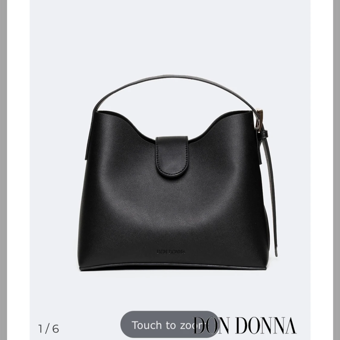 Svart axelväska från Don Donna