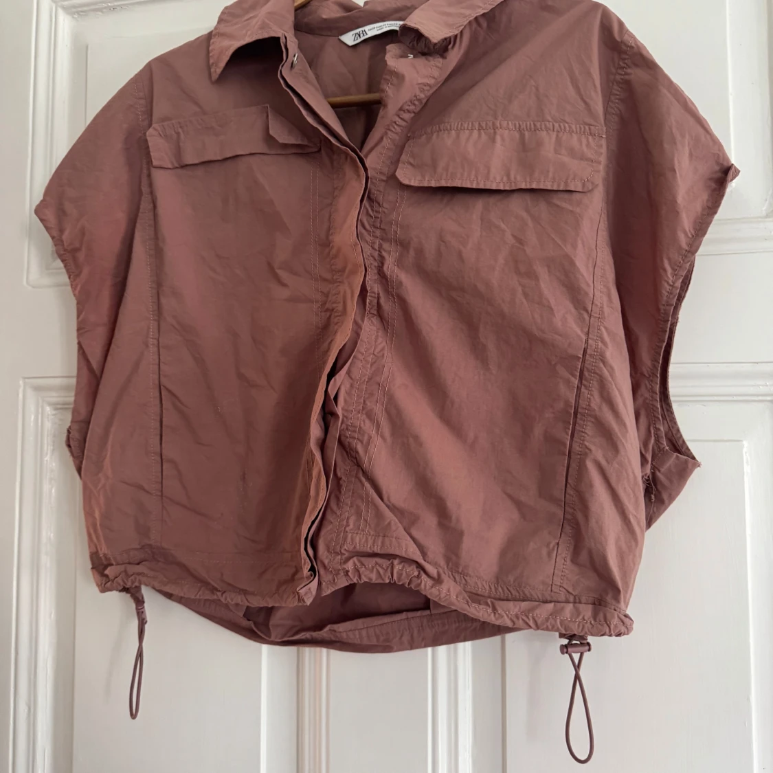 Brun loose väst från Zara