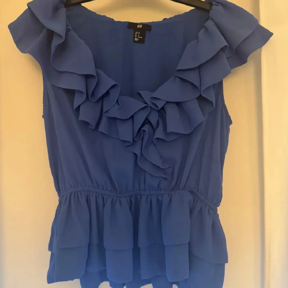 Blå volangblus från H&M