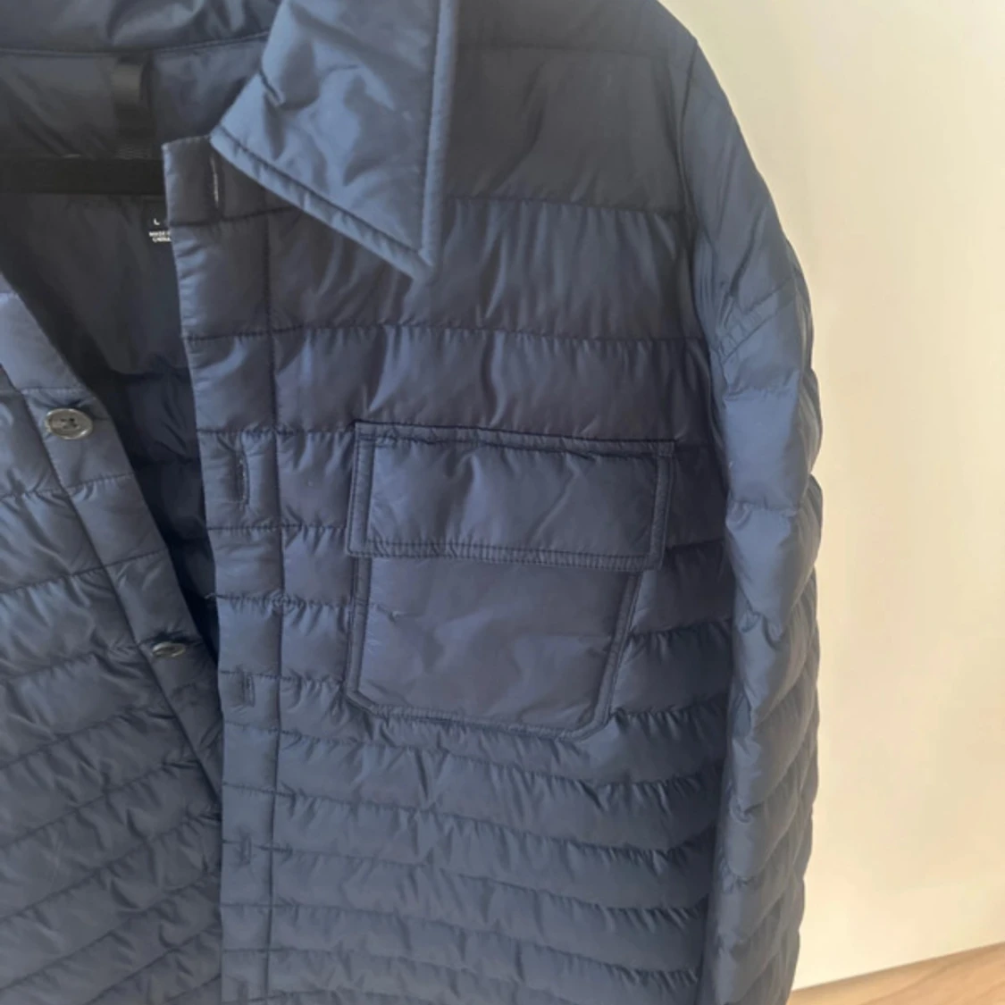 Mörkblå quiltad pufferjacka J.Lindeberg - 1