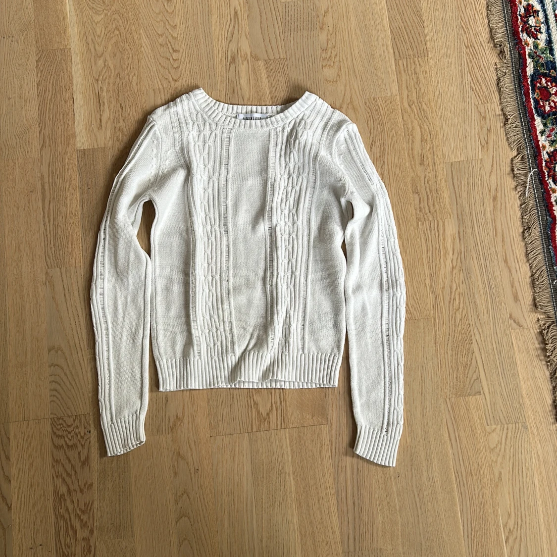 Vit stickad tröja från Size & Needle