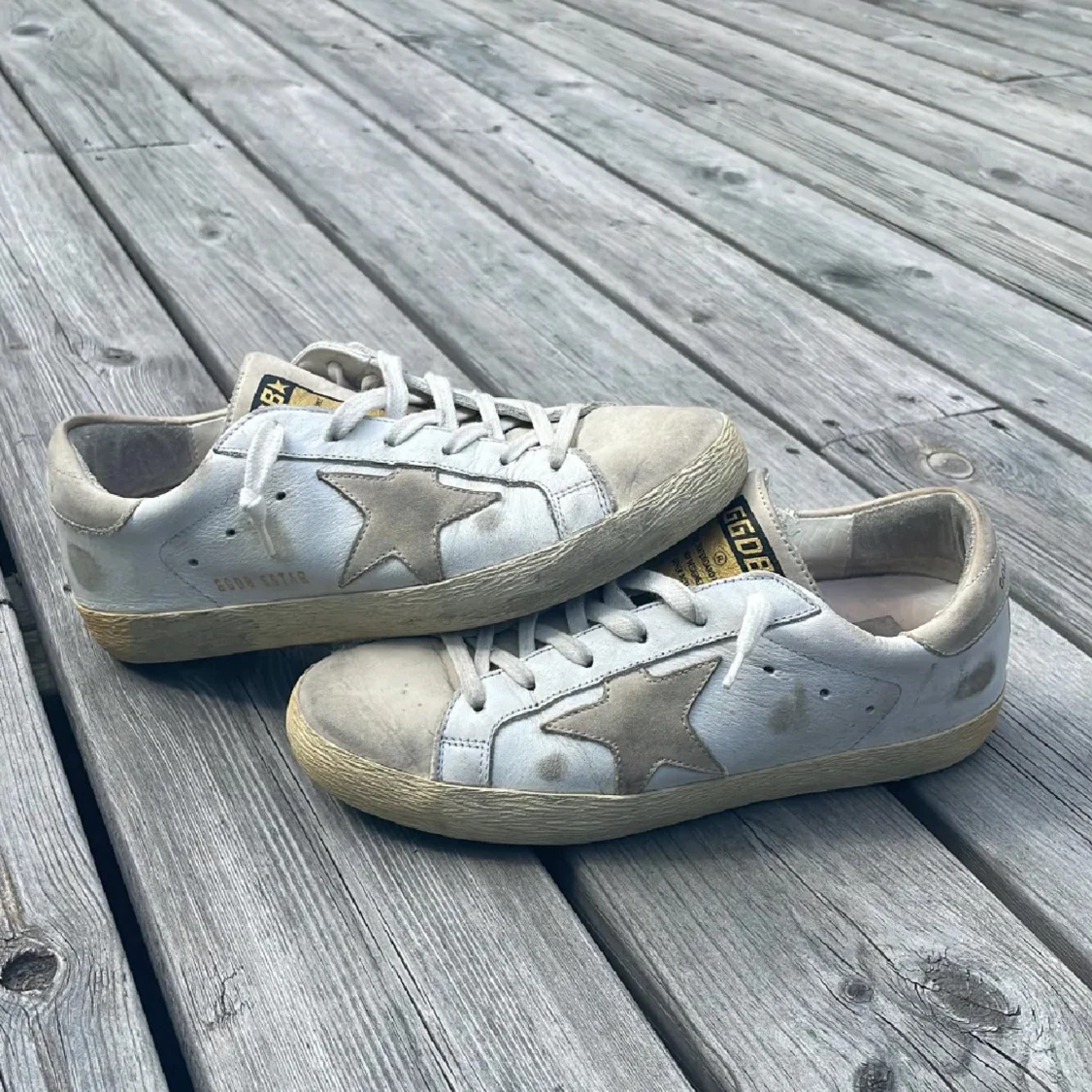 Golden Goose vita sneakers med stjärna