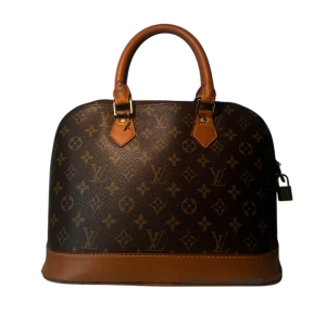 Brun handväska  - Säljer en klassisk brun handväska med det ikoniska monogrammönstret. Väskan har två handtag i brunt skinn och en dragkedja upptill. Perfekt för dig som vill ha en tidlös accessoar med stil. 👜