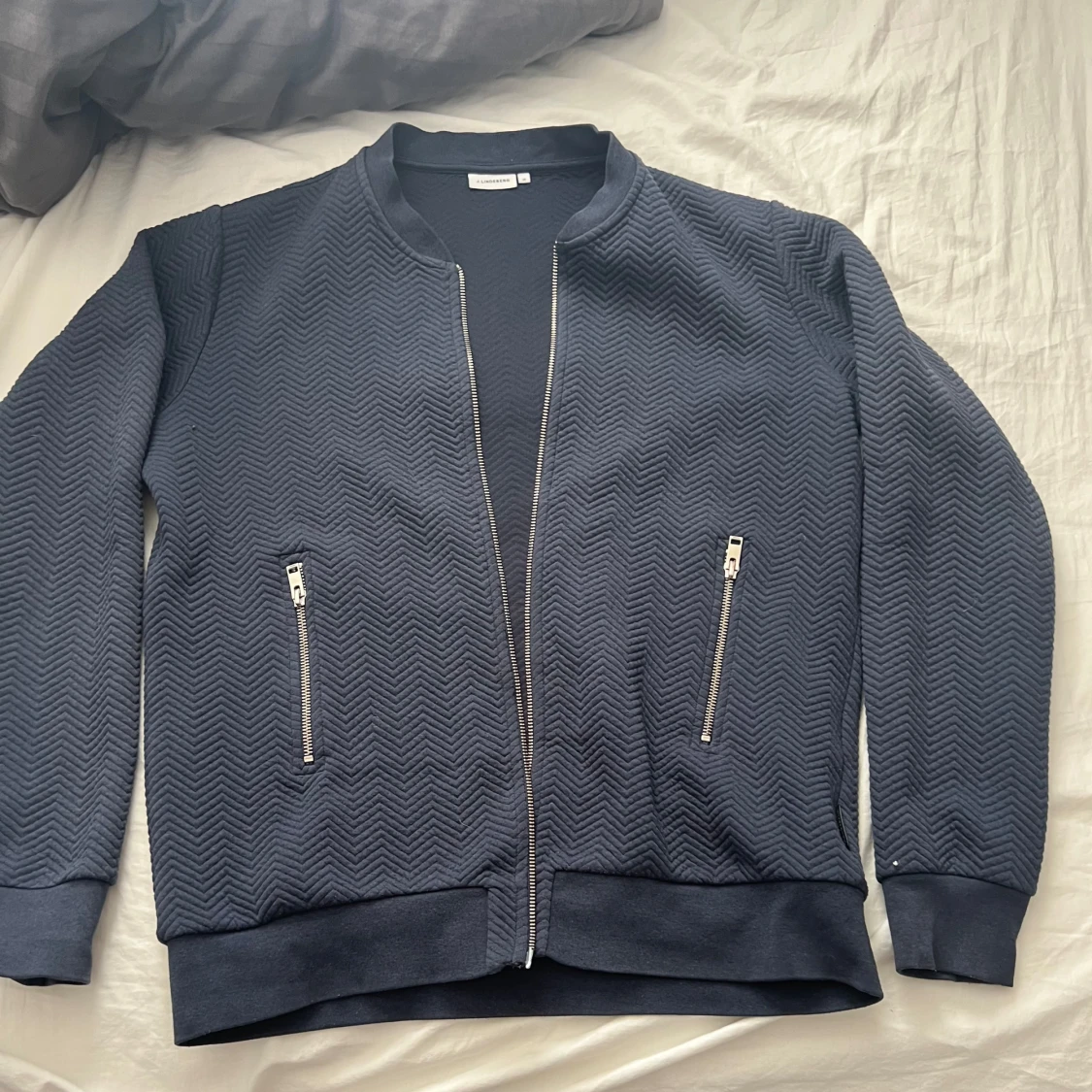 Mörkblå zip up tröja från J.Lindeberg - 1