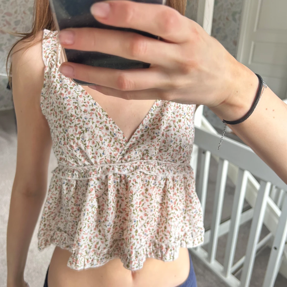 Blommig ärmlös topp