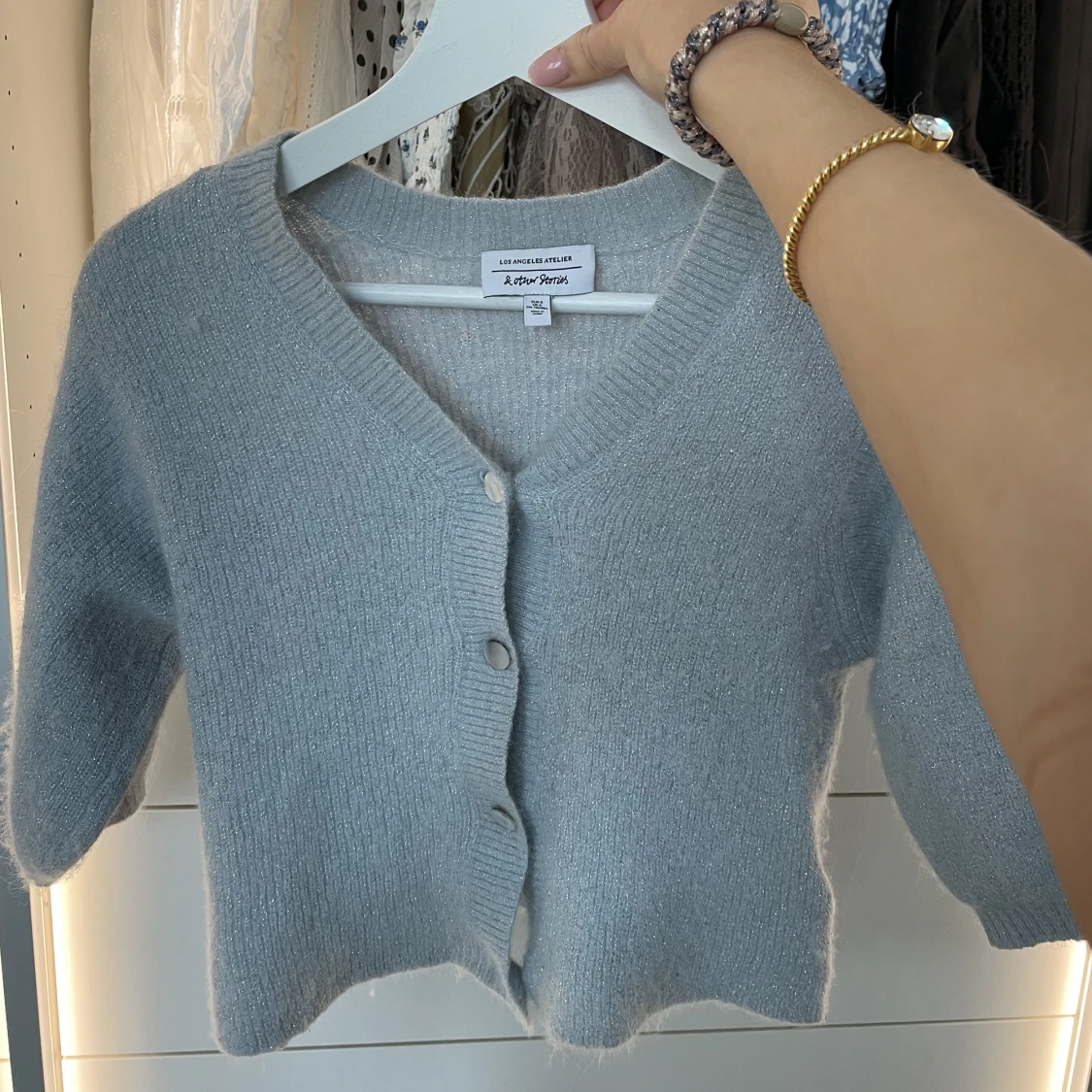 Glittrig kortärmad kofta - 1