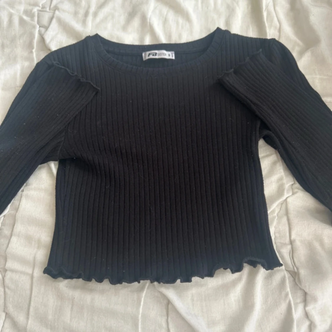 Svart ribbad långärmad topp FB Sister