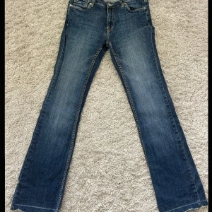Blå jeansbyxor Vintage - Vintage Jeans från Lindex. Storlek 38 men sitter mer som en 36. 
