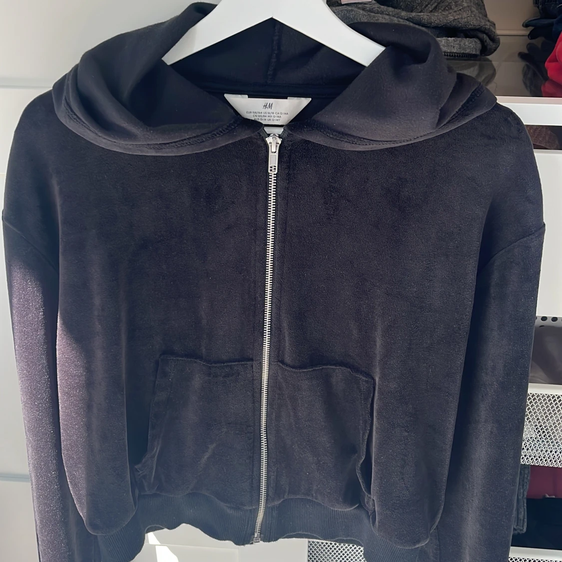 Svart munkjacka med huva från H&M