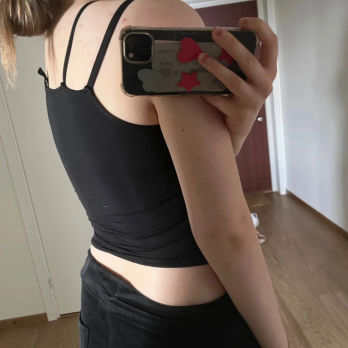 Svart asymmetrisk croppad linnetopp - 1