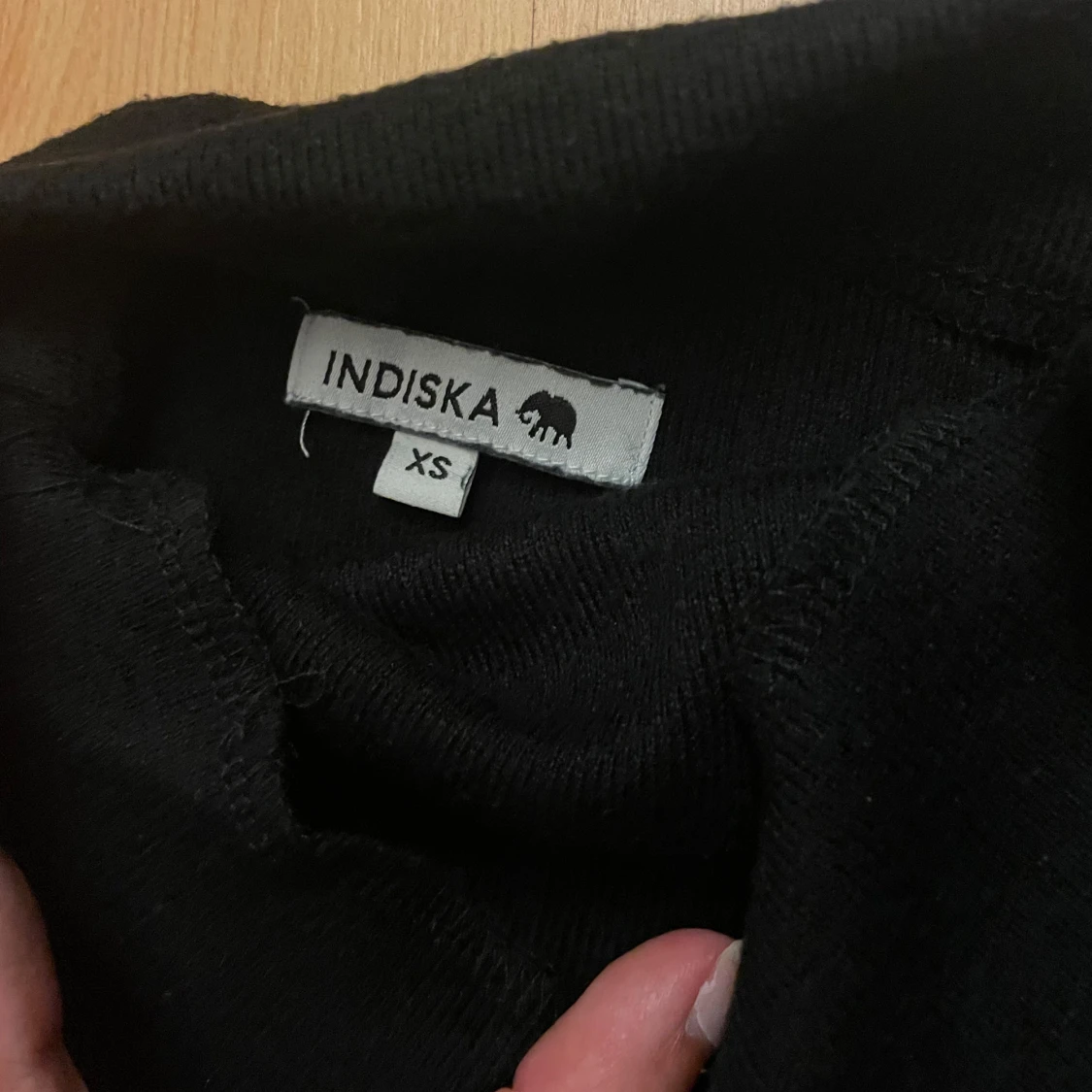 Svart kortärmad poncho från Indiska - 1